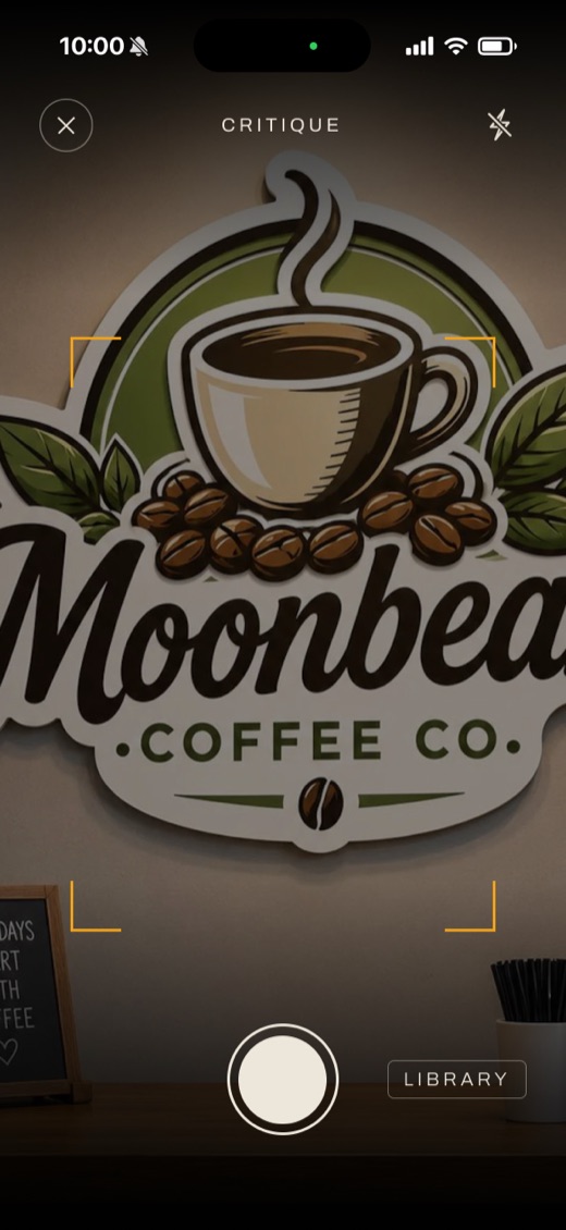 Sightline's camera pointed at a coffee-shop sign, framing it to critique